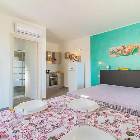 Milo Vacanze * Торре-Пали